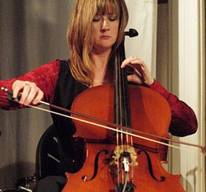 performer posing with their instrument